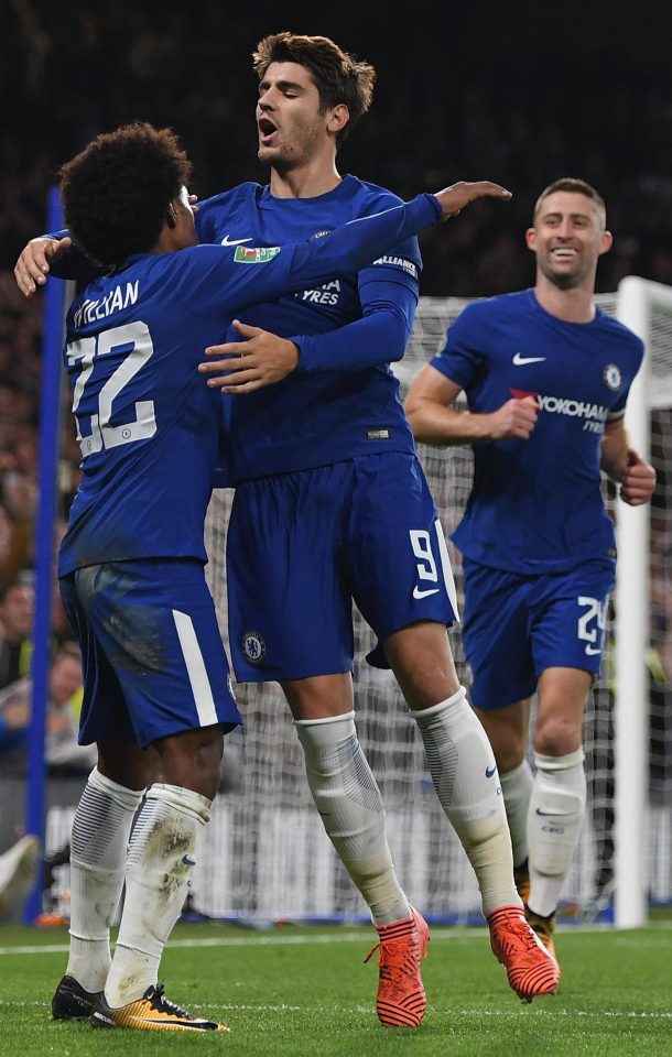  Willian celebrates with Alvaro Morata and Gary Cahill after scoring Chelsea's second goal during the Carabao Cup tie with Everton