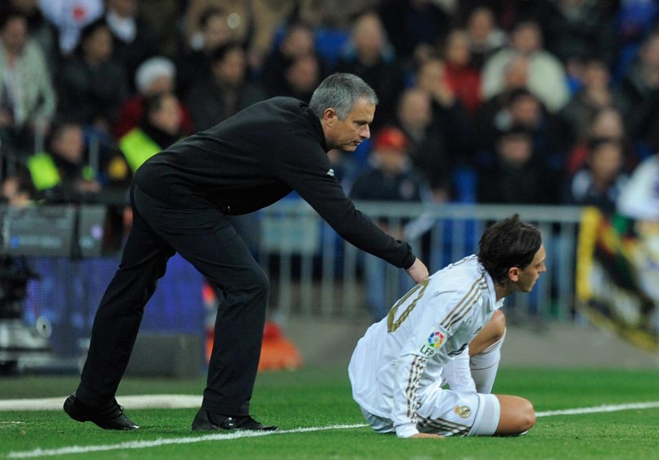  Jose Mourinho gives Mesut Ozil and helping hand while at Real Madrid