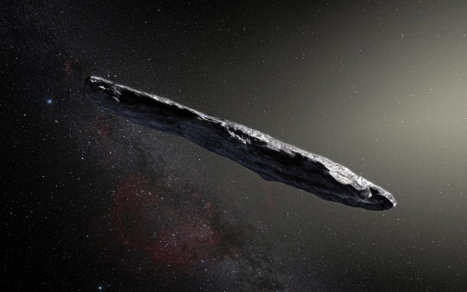  An artist's impression showing the huge cigar-shaped object called Oumuamua