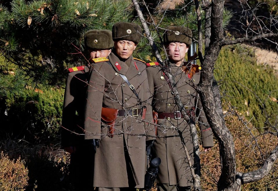  The broadcasts reportedly infuriate North Korean military officials. Pictured are North Korean soldiers at the border