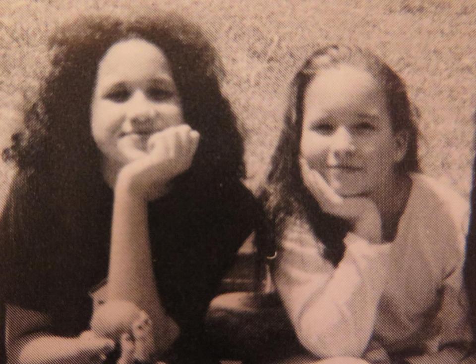  Pictures from the past show Meghan posing with friends as a child