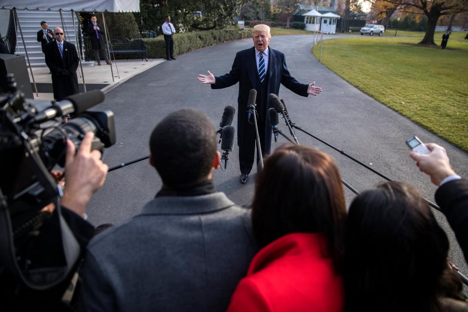  He was speaking to reporters after a former key aide admitted he lied to the FBI