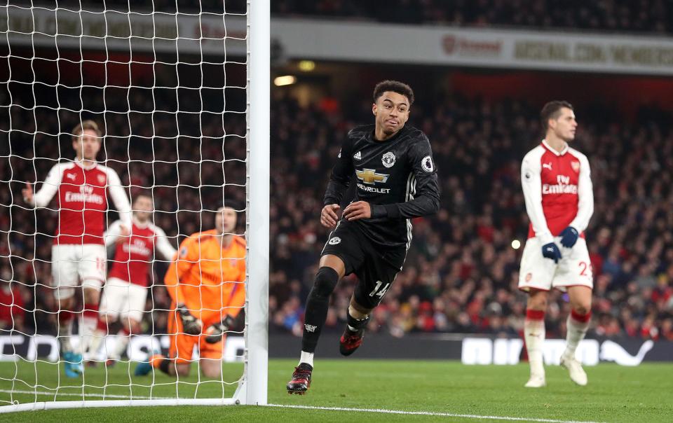  Lingard kept United in the title race with a double against Arsenal