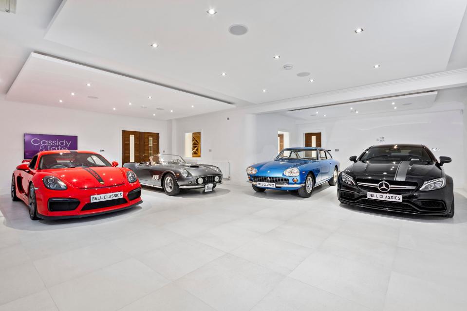  The garage boasts plenty of room to store supercars in style