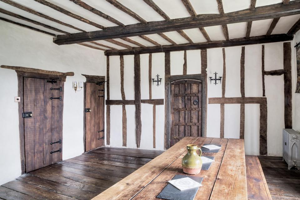  The great hall features wooden beams and floors