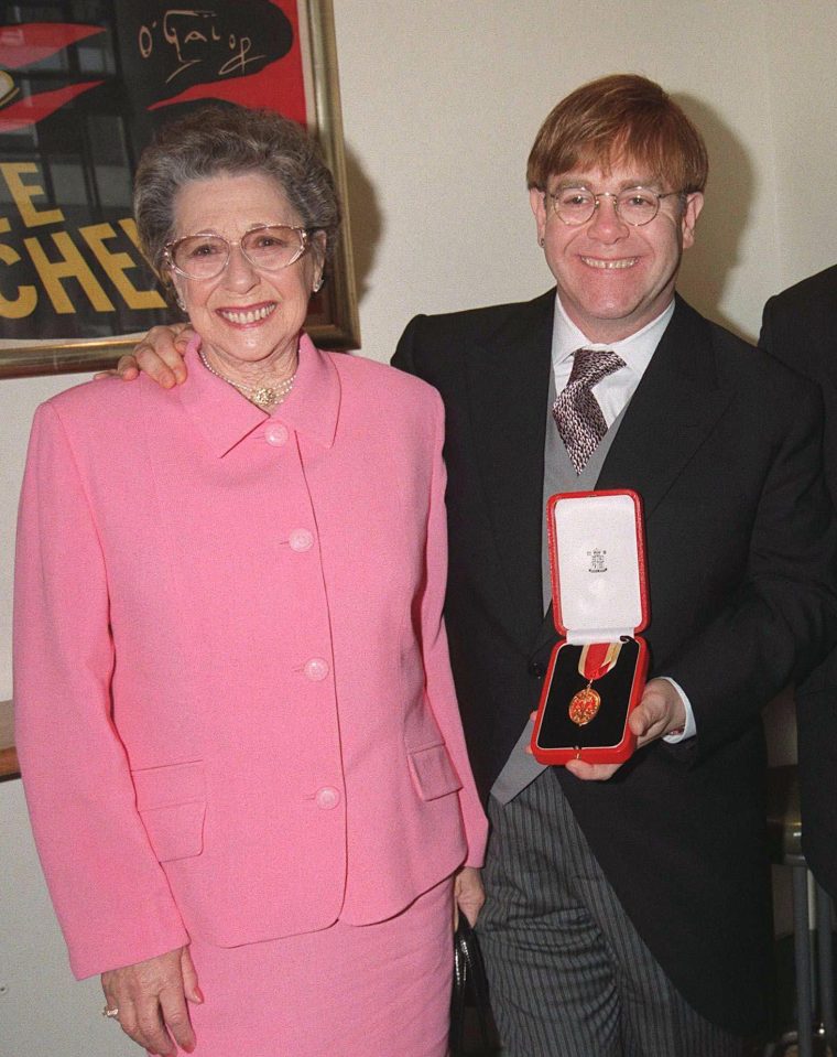  Elton John pictured with his proud mum after receiving a knighthood in 1998