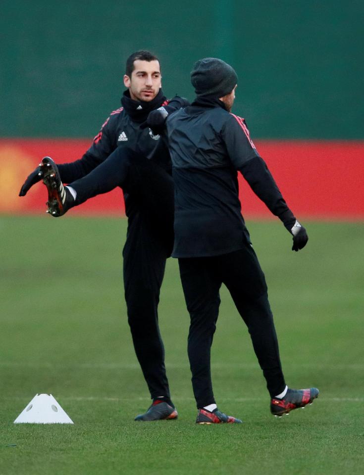  Henrikh Mkhitaryan does warm-up drills at Manchester United's Carrington training ground