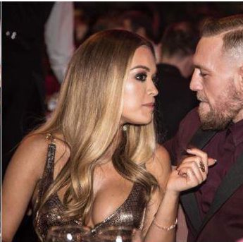  Rita Ora supposedly sat on Conor McGregor's lap and another woman has branded her a 'whore'