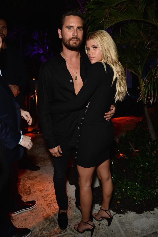  Sofia Richie and Scott Disick pose together at the party