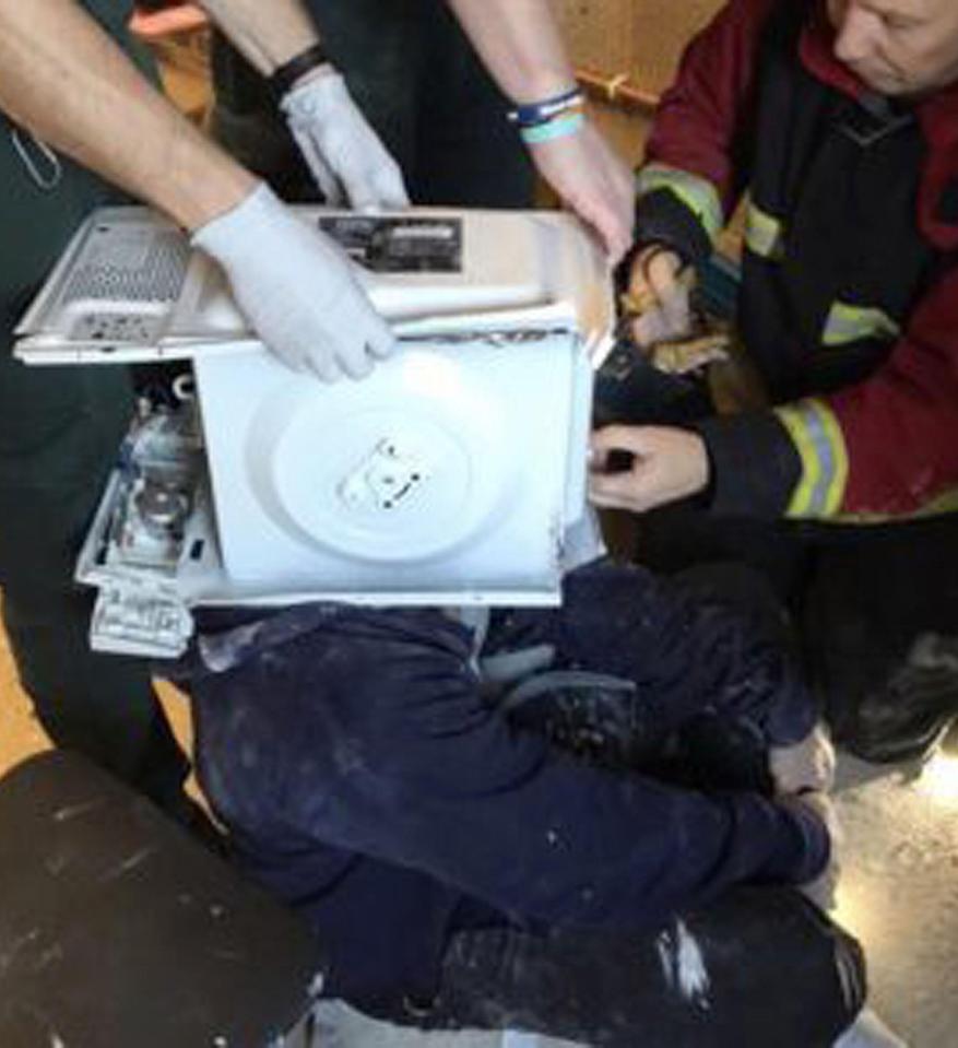  Fire and rescue crews spent nearly an hour trying to free a YouTuber who cemented his head into a microwave