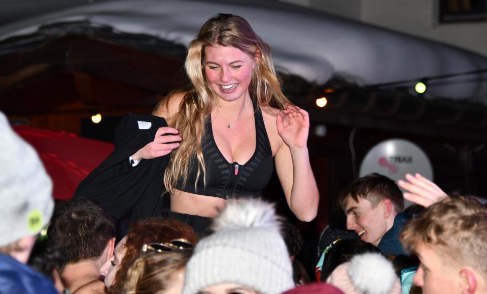  Some of the students necked bottles of rose wine and champagne and then danced on tables in full ski gear