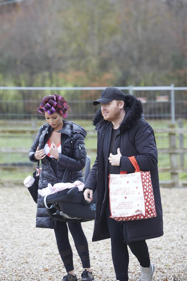  The beauty even kept her hair in rollers as she arrived on set