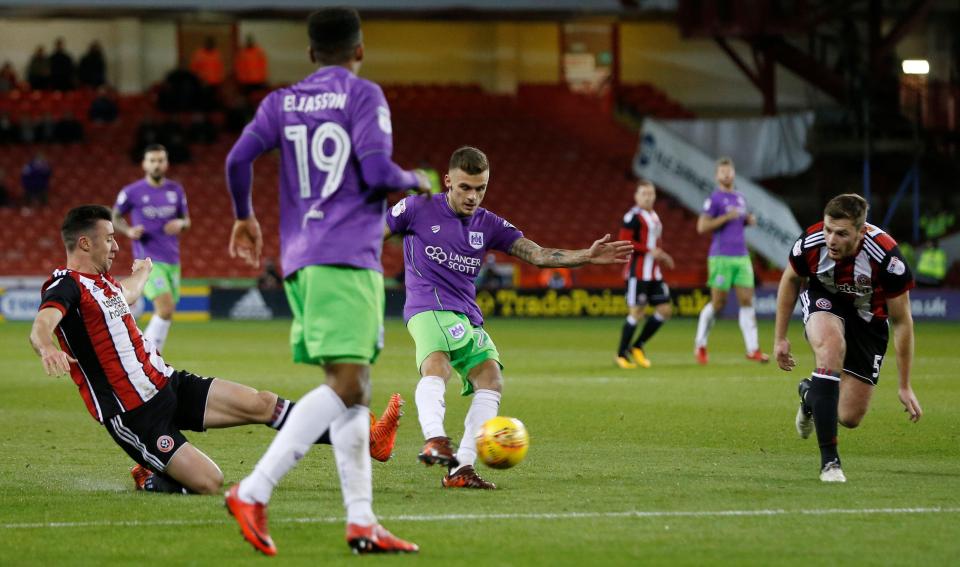  Jamie Paterson opens the scoring with a swerving drive at Bramall Lane