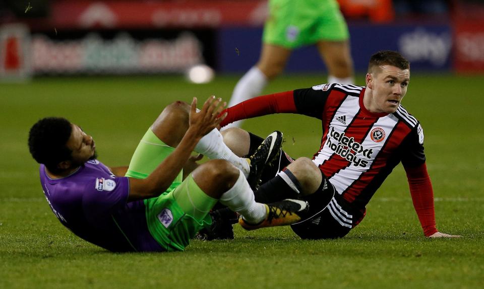  John Fleck was sent off for a two-footed tackle on Korey Smith