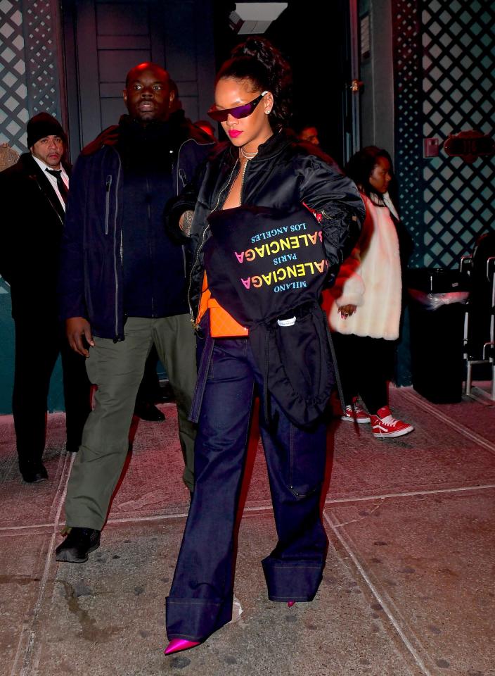  Rihanna suspiciously covered her left hand with a Balenciaga hoodie amid engagement speculation