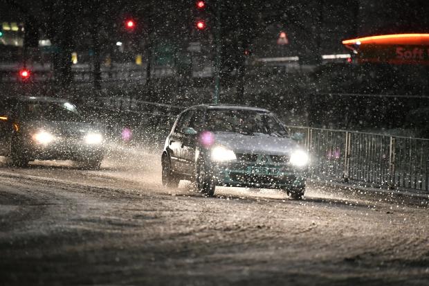 Britain has been hit by a weather bomb this morning as the country wakes up to heavy snowfall