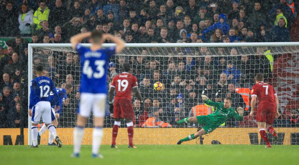  Wayne Rooney converted the penalty to level with Liverpool