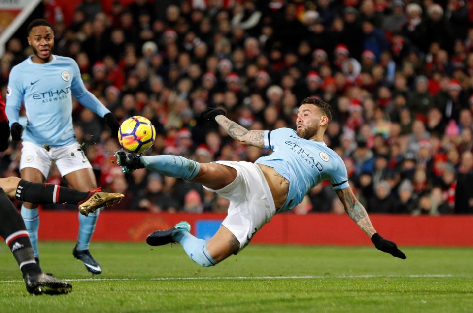  Man City defender Nicolas Otamendi crashed home