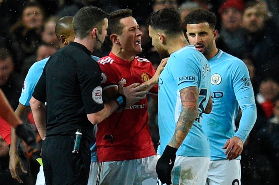  Ander Herrera argues with Nicolas Otamendi after the incident