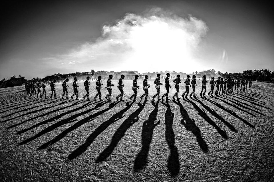  Tribespeople take part in Kuarup - an indigenous ritual - in the Brazilian state of Mato Grosso