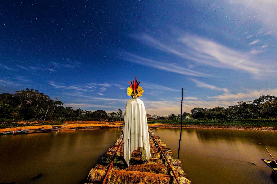  A member of the Tanawy Xucuru Cariri tribe stands beside the So Francisco river in the state of Alagoas