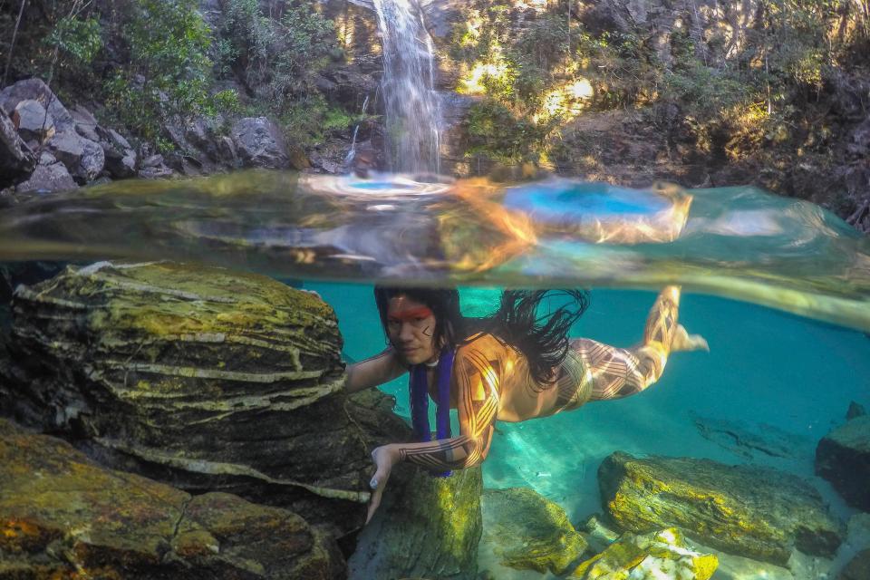  These images, including this one of an indigenous woman swimming by the Santa Bárbara waterfall, offer a rare insight into some of Brazil's rarest tribes