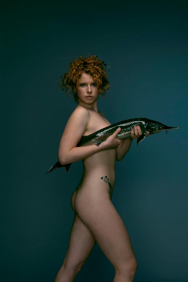  Jessie Buckley posed with a sturgeon across her chest