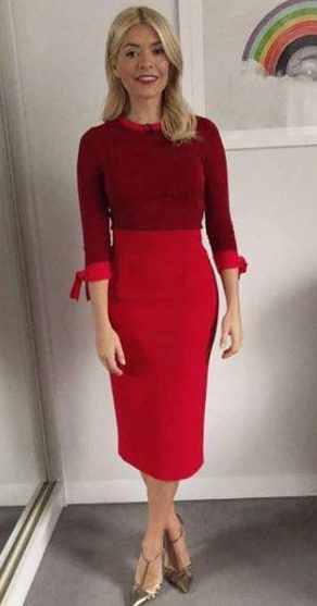  Scarlet woman... We loved this two-tone red ensemble which showed off her slim figure. Knitwear by Hobbs London, skirt by Karen Millen and shoes by SJP Collection