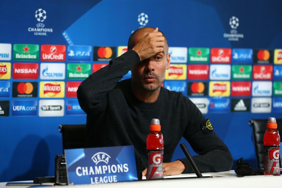  Pep Guardiola loved showing off his Stone Island jumper at press conferences