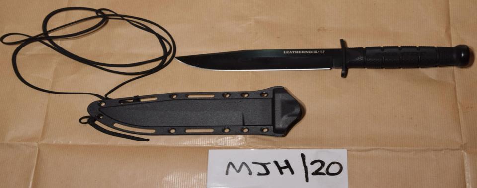  Police found a combat knife and a life-like dummy used for stabbing practice