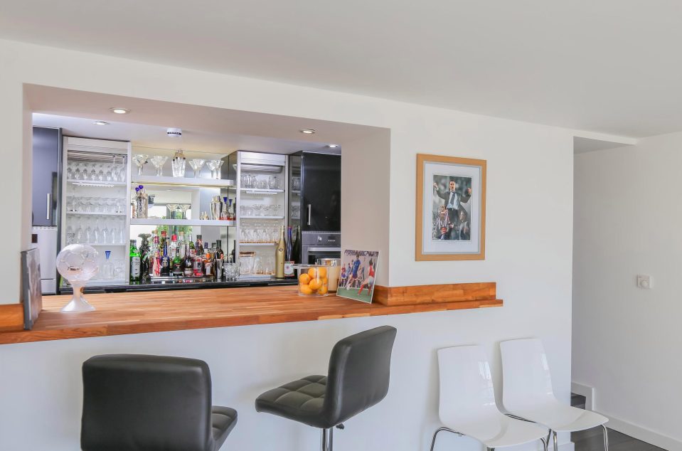  The lower ground floor entertainment zone also boasts its own bar