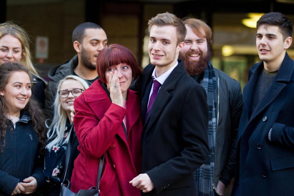  Liam celebrating with his family outside court