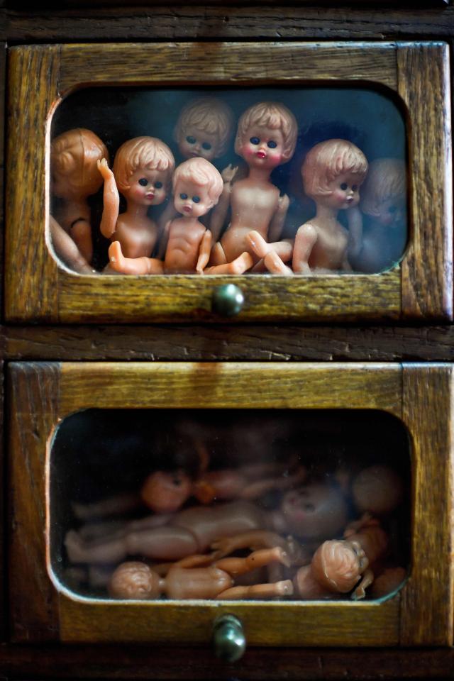  Drawers are packed with thousands of dolls and parts