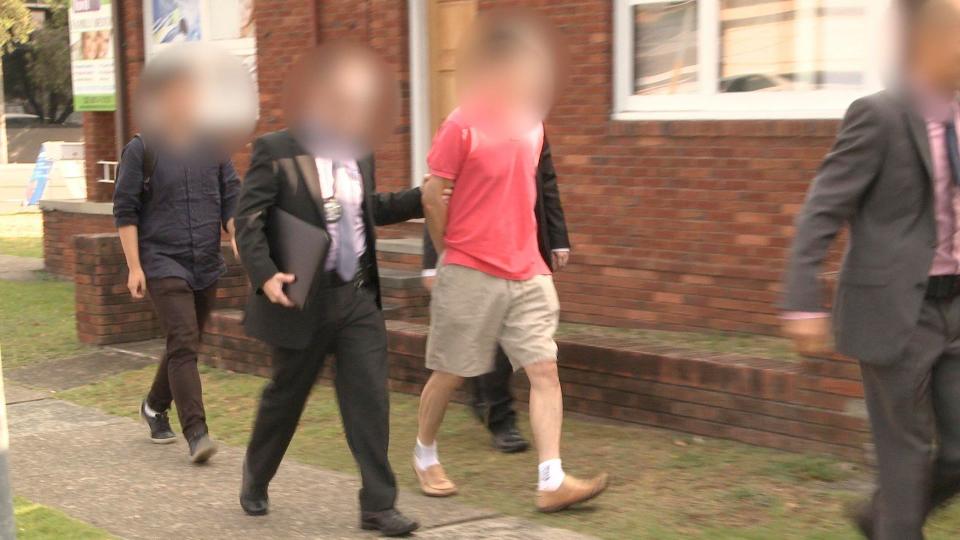  Australian Federal Police officers arrest the man during an operation in Sydney