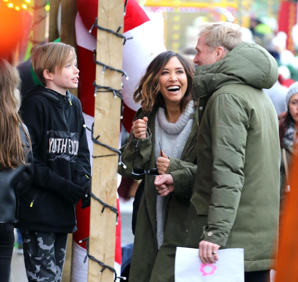  Her new man Simon Motson, 44, kept her warm as the pair got close and held hands around the Christmas market