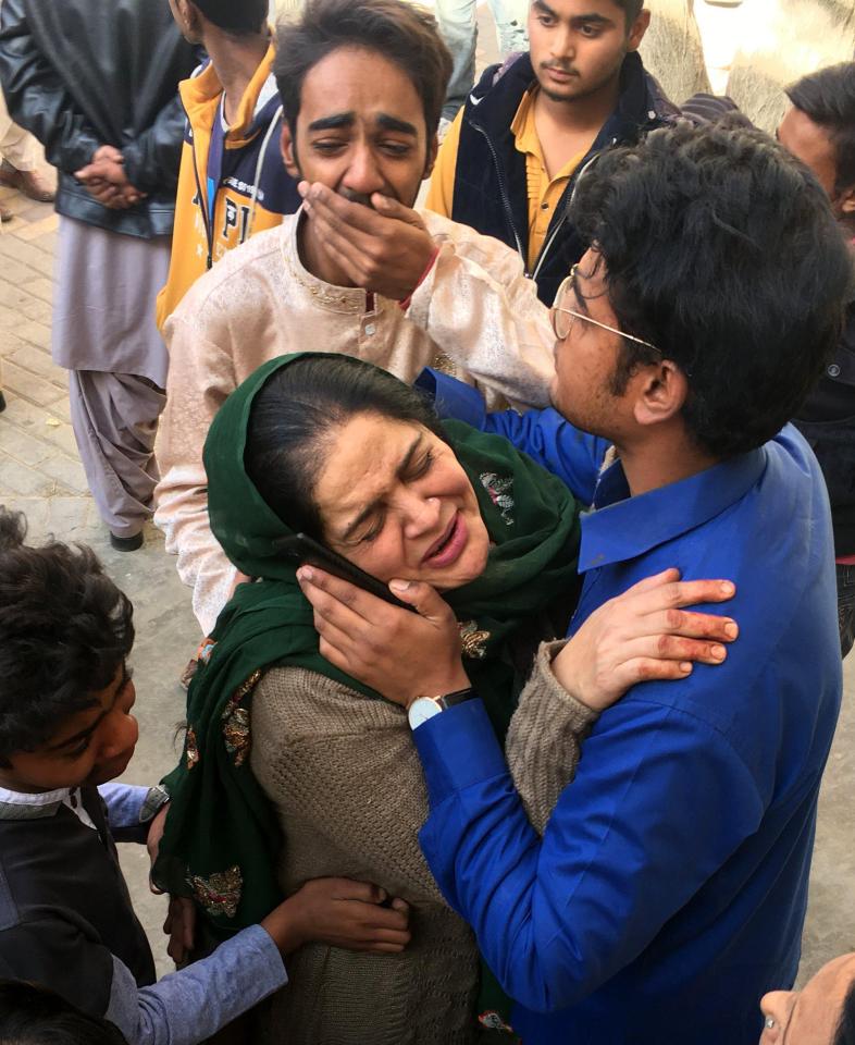  Locals react after the attack at the church in Quetta, Pakistan