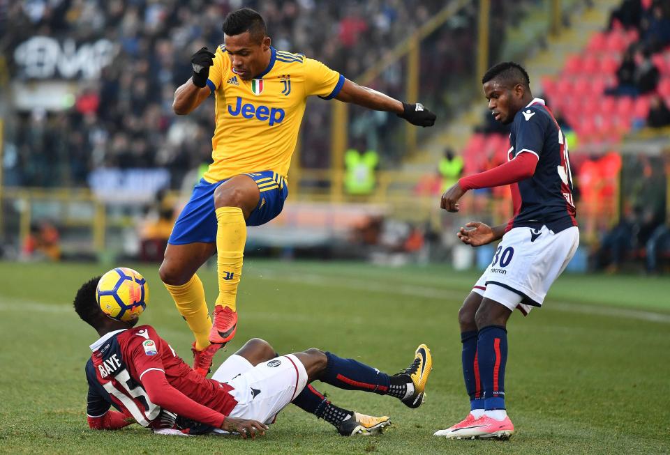  Alex Sandro rides a challenge during Juventus' 3-0 win over Bologna