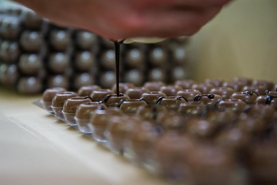  With the help of her dad, Flo worked on a unique method of layering the chocolate