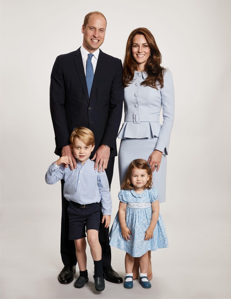 The Duke and Duchess of Cambridge smile with their children George and Charlotte for their family Christmas card