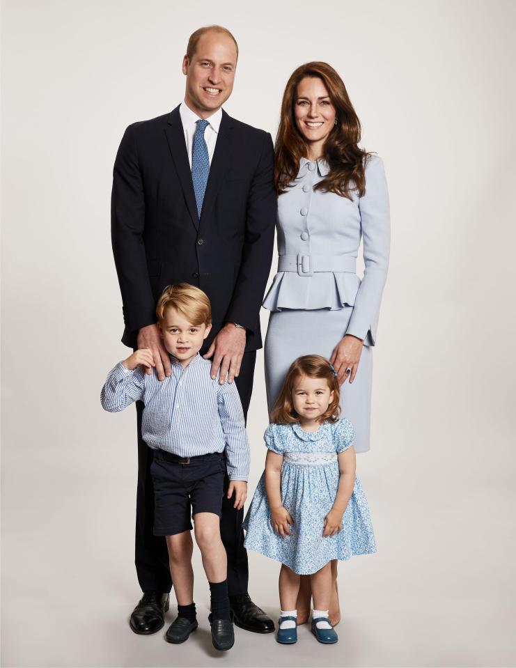  The Duke and Duchess of Cambridge smile with their children George and Charlotte for their family Christmas card