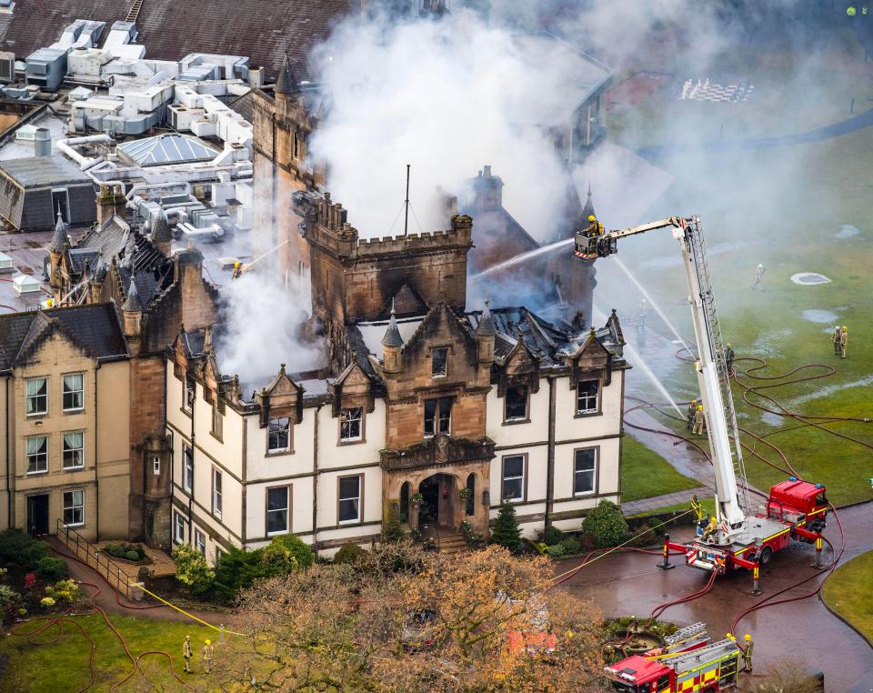  Fire could be seen pouring out of the hotel after the fatal blaze