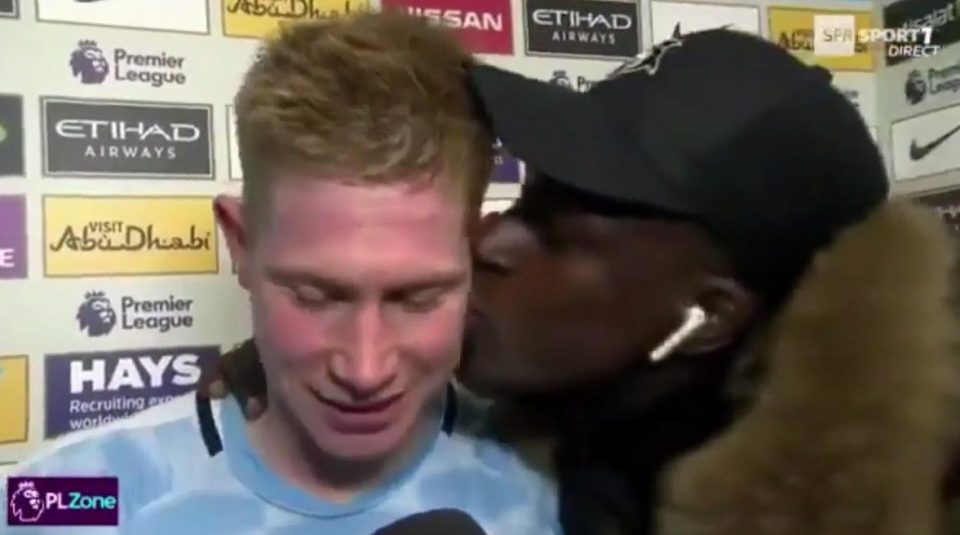  A peck on the cheek for Kevin de Bruyne from injured teammate Benjamin Mendy