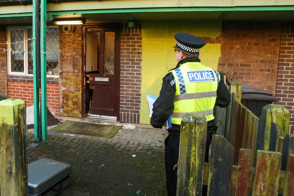  A police officer guards this flat on Verdon Street, Sheffield