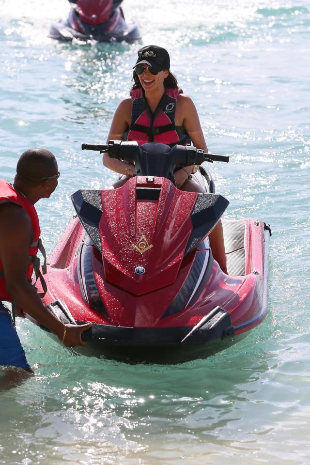  Gorgeous Lauren grins as she takes to the waves