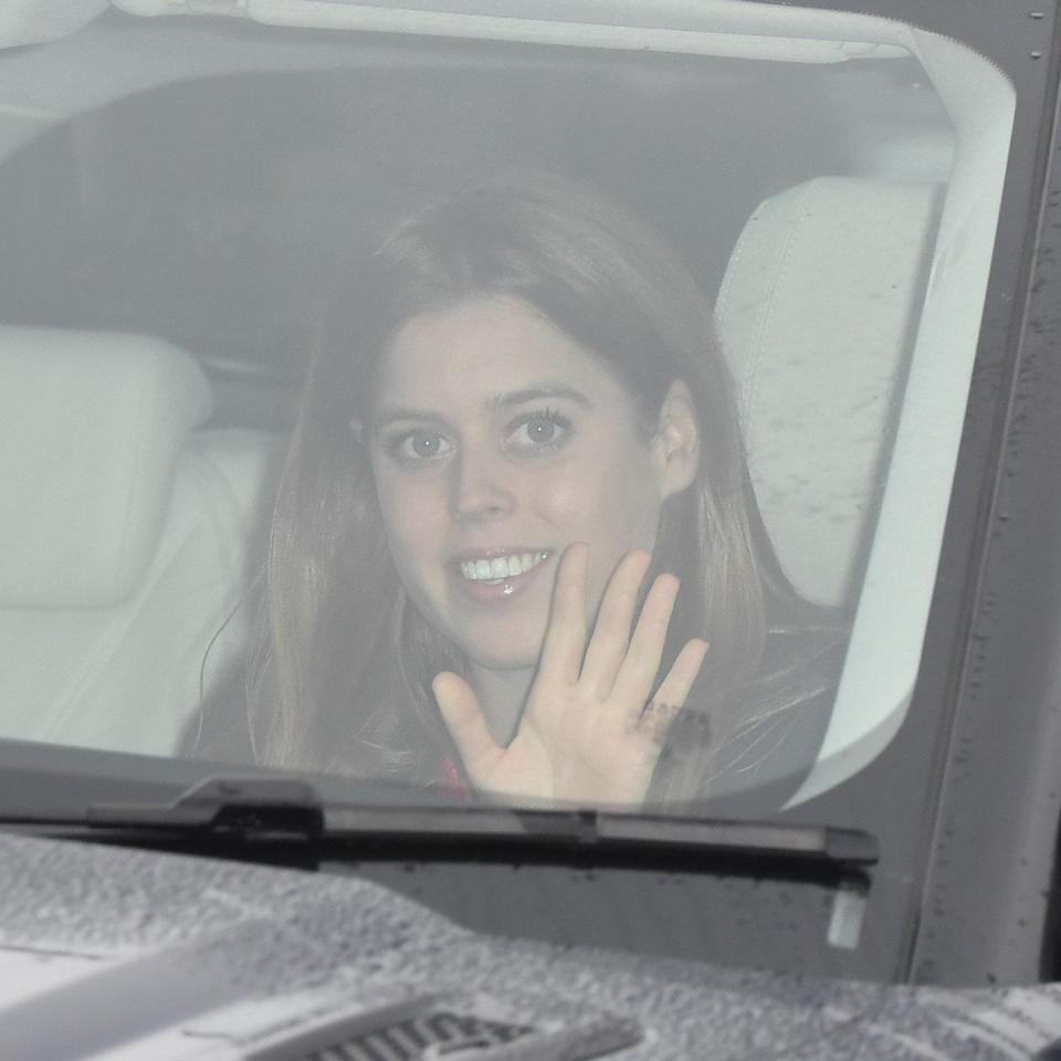  Eugenie's sister Princess Beatrice waved to the cameras as she was driven into the palace