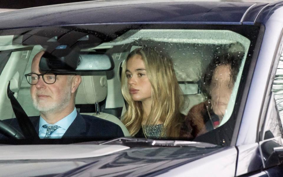  Lady Amelia, 22, could be seen pouting in the backseat