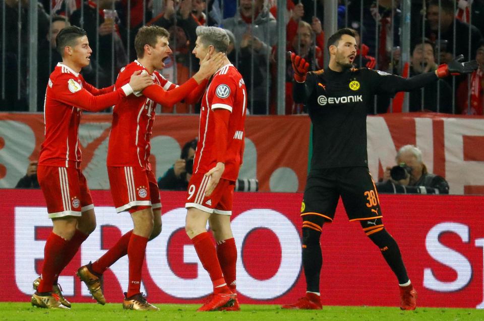  Thomas Muller celebrates after giving Bayern Munich a 2-1 lead in DFP Cup