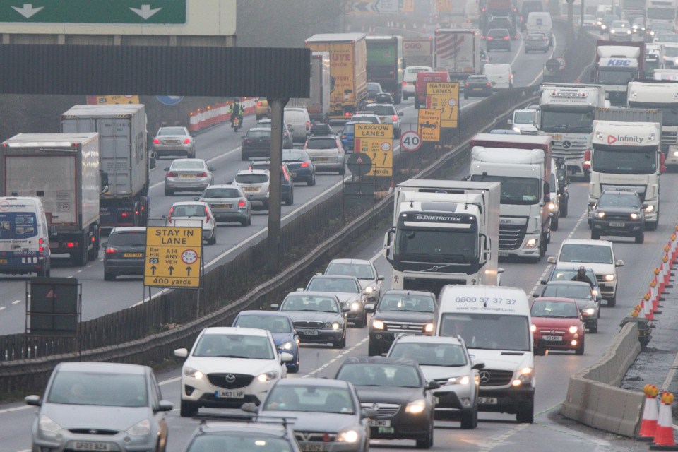 Motorists were stuck in heavy traffic on the A14 near Cambridge yesterday  on one of the busy travel days of the year