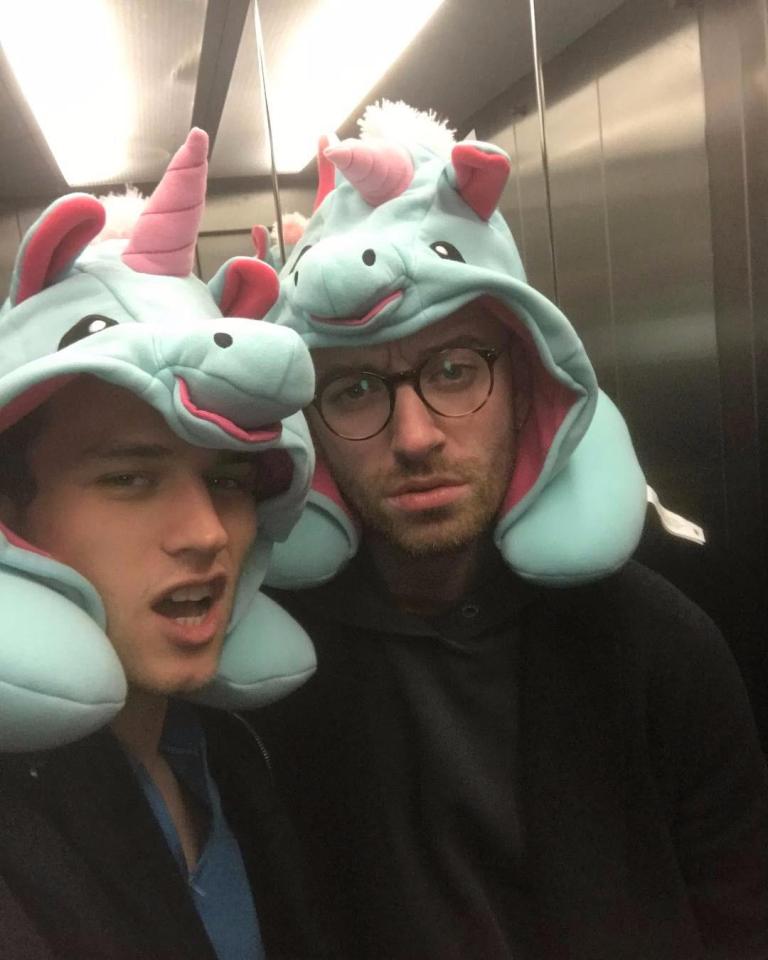  Sam Smith and Brandon Flynn shared their first selfie on Thursday, posing in a lift wearing comedy hats