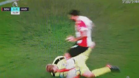  Charlie Austin has been charged with violent conduct after kicking Jonas Lossl in the face